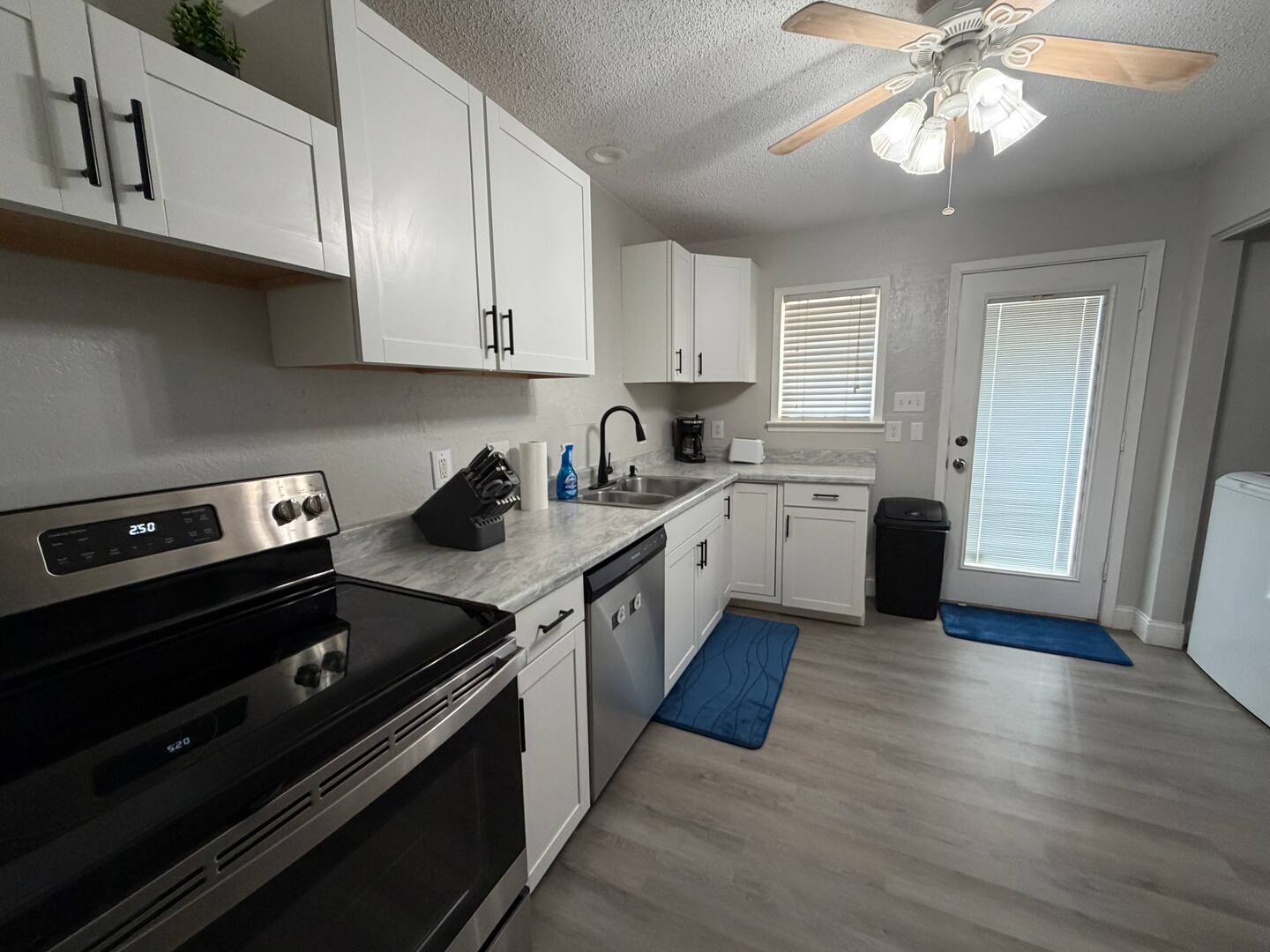 Full kitchen at Sunset Cottage Airbnb in Abilene Texas