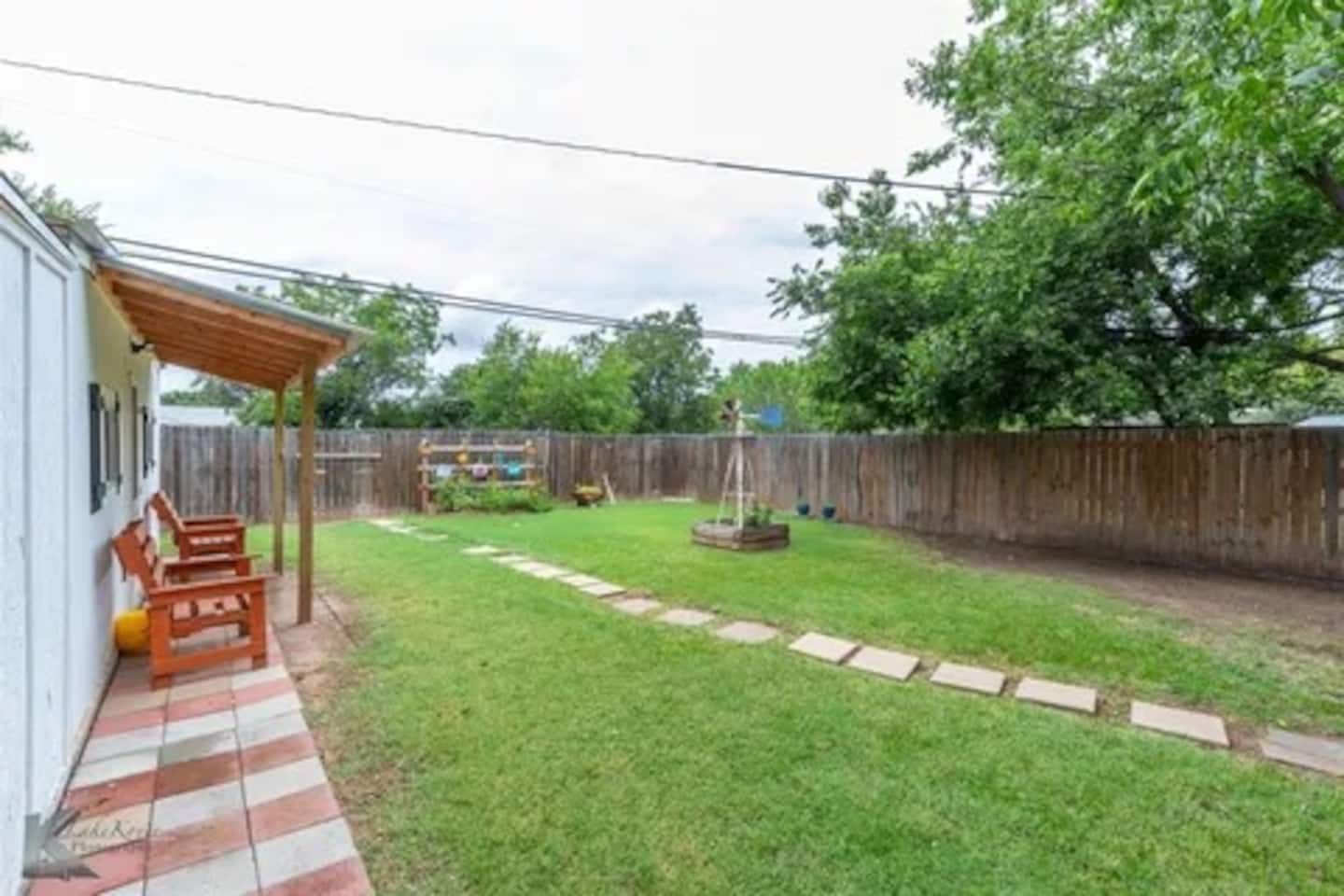 Backyard and porch area at The Windmill Cottage